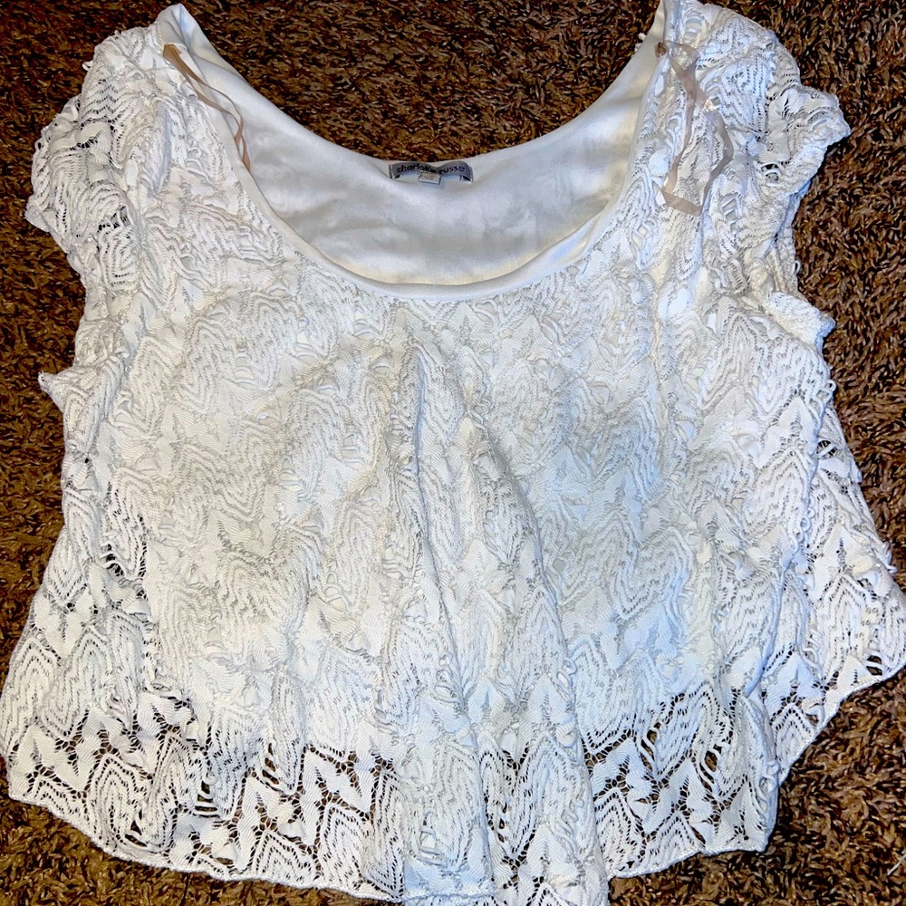White lace crop top with ruffle sleeve and lace detail #charlotterusse #lace